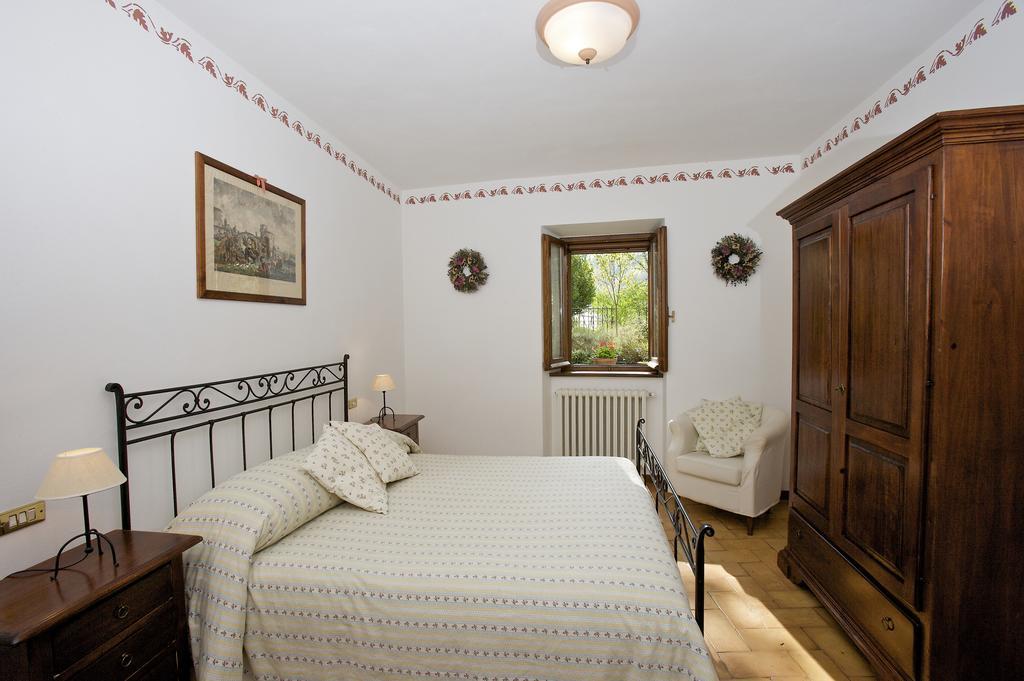 Brigolante Guest Apartments Асизи Стая снимка