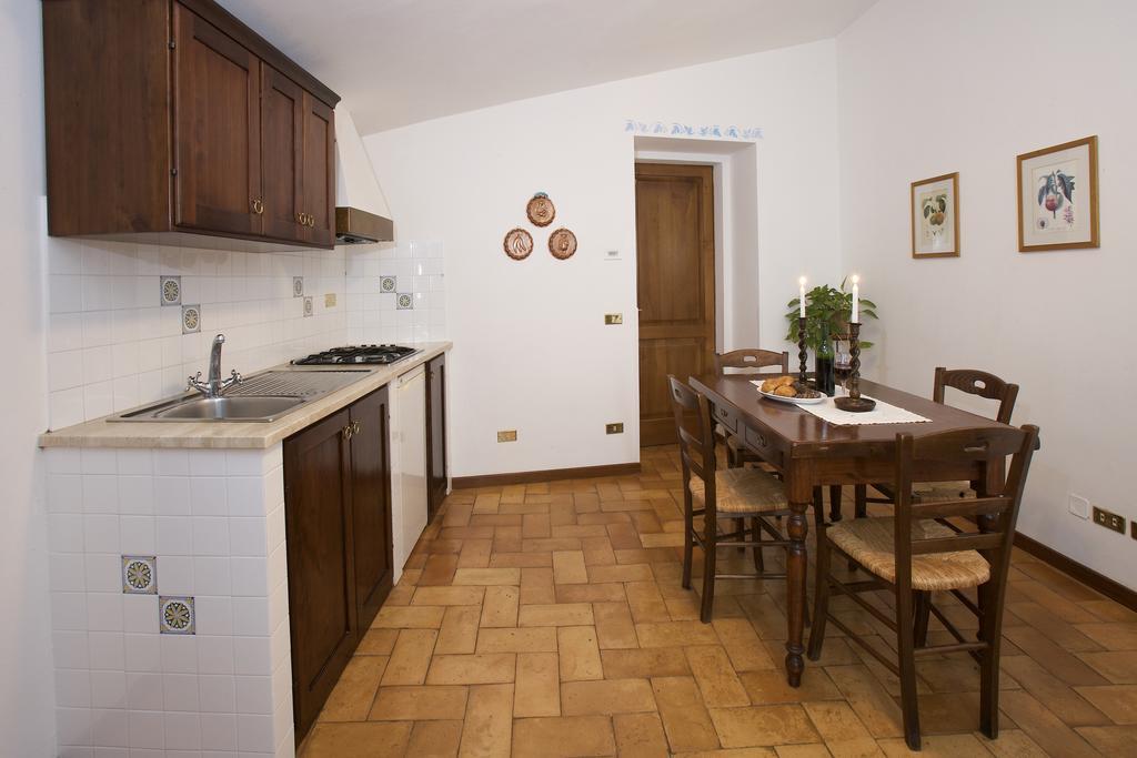 Brigolante Guest Apartments Асизи Стая снимка