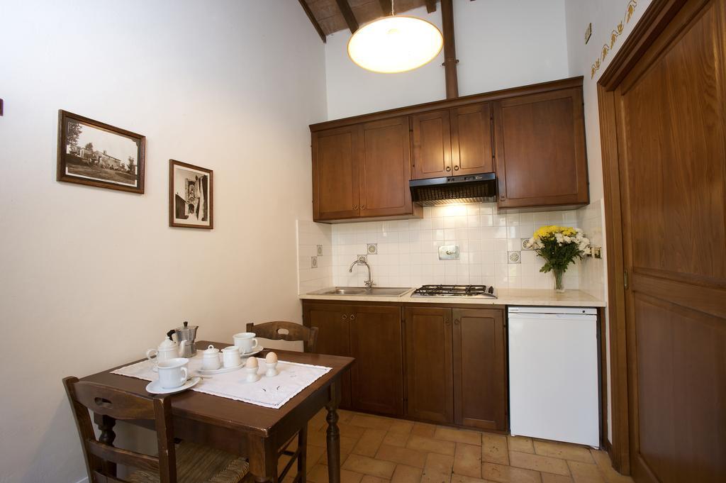 Brigolante Guest Apartments Асизи Стая снимка