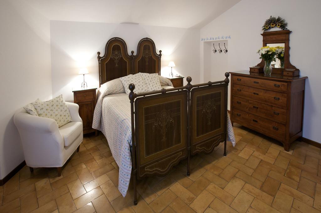 Brigolante Guest Apartments Асизи Стая снимка