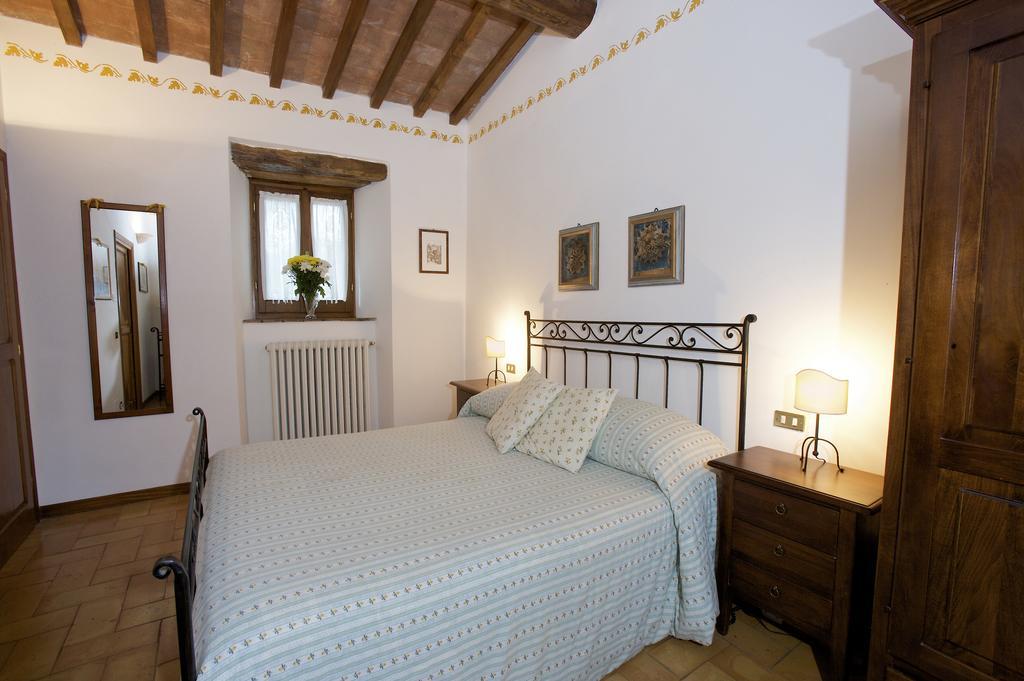 Brigolante Guest Apartments Асизи Стая снимка